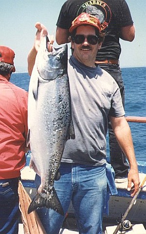 Peter holding a salmon